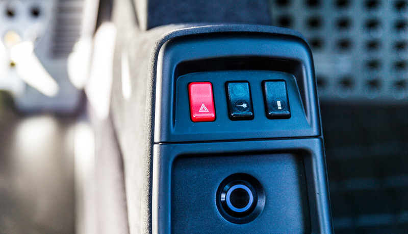 That subtle circular button is the happy go fast button.